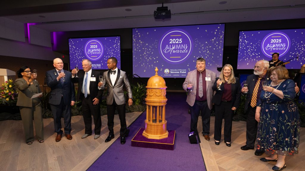 2025 Alumni Awards winners toasting