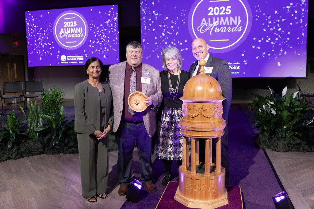 Photo of Interim Chancellor Ghandi, Tom Weaver, Alumni Board President Jody Rowland, and Dean Stuart Benkert