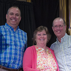 Laura Cleveland Shepherd '82 and Scott Shepherd '82 with Rick Stuck ’82.