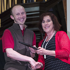 Gideon Erkenswick '06 with Susan Henken-Thielen ’80.