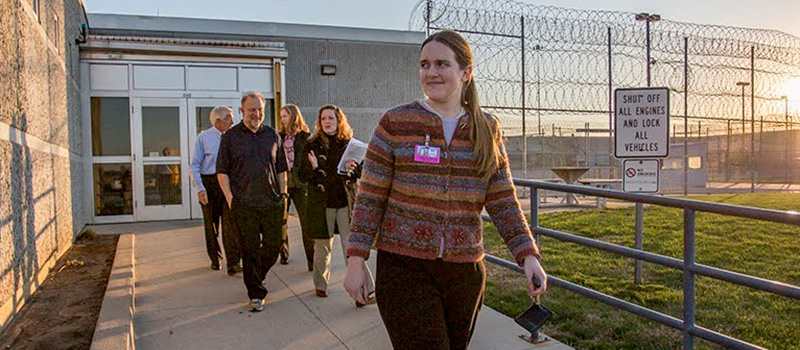 Emily Guenther ’07 walks out of an Iowa Prison.