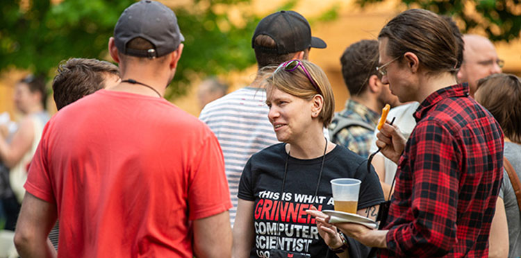 Christina Gerpheide ’09 chats with classmates.