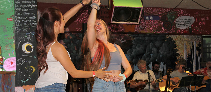 Jenny Dong ’17 spins Lizzie Eason ‘17 as they dance in Bob's Underground.
