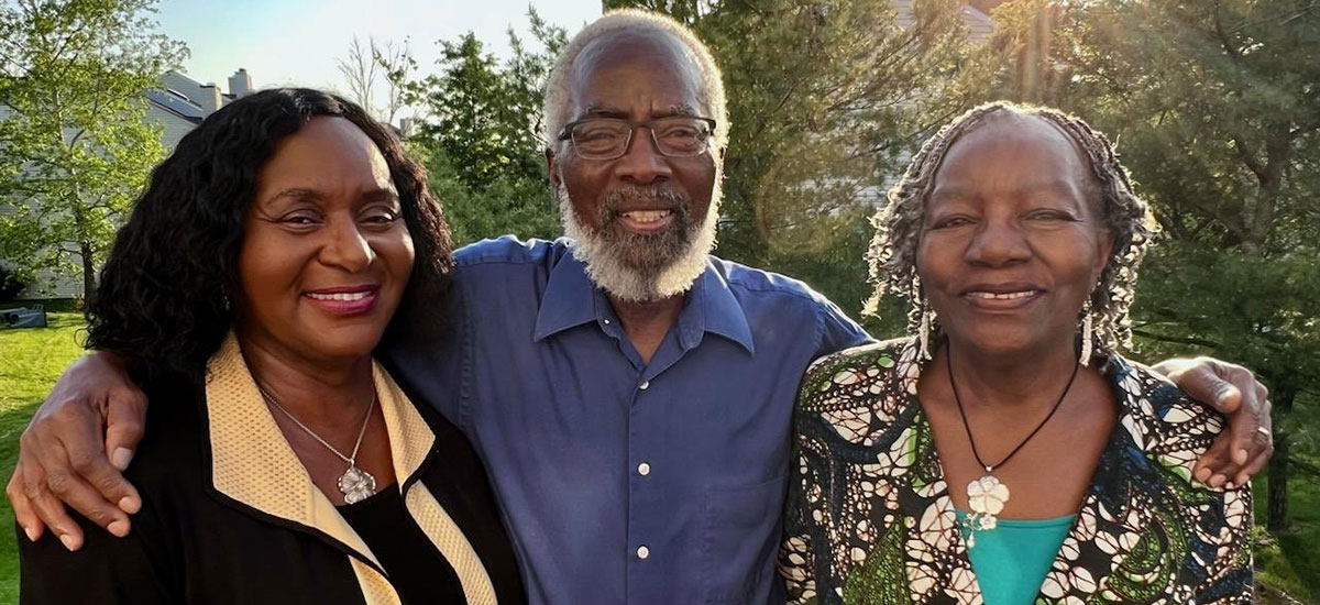 Christina Cutlip ’83, left, with her aunt and uncle, Rogers and Josephine Gurira.