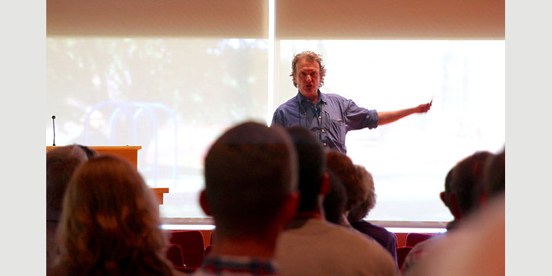 Professor Bill Ferguson ’75 presents during Alumni College.