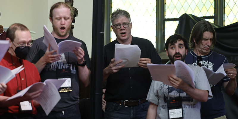 The alumni choir sings during Alumni Assembly.