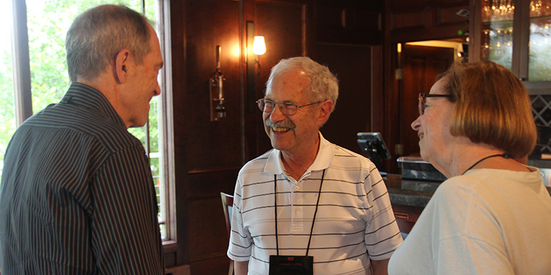 Martin Korn '67 chats with two other members of the 55th reunion cluster.