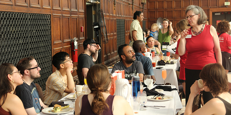 President Anne F. Harris talks with 10th reunion attendees during brunch.