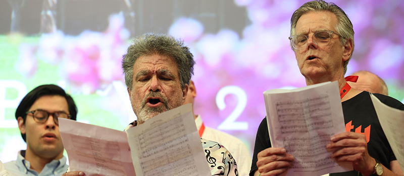 The Alumni Choir sing during Alumni Assembly.