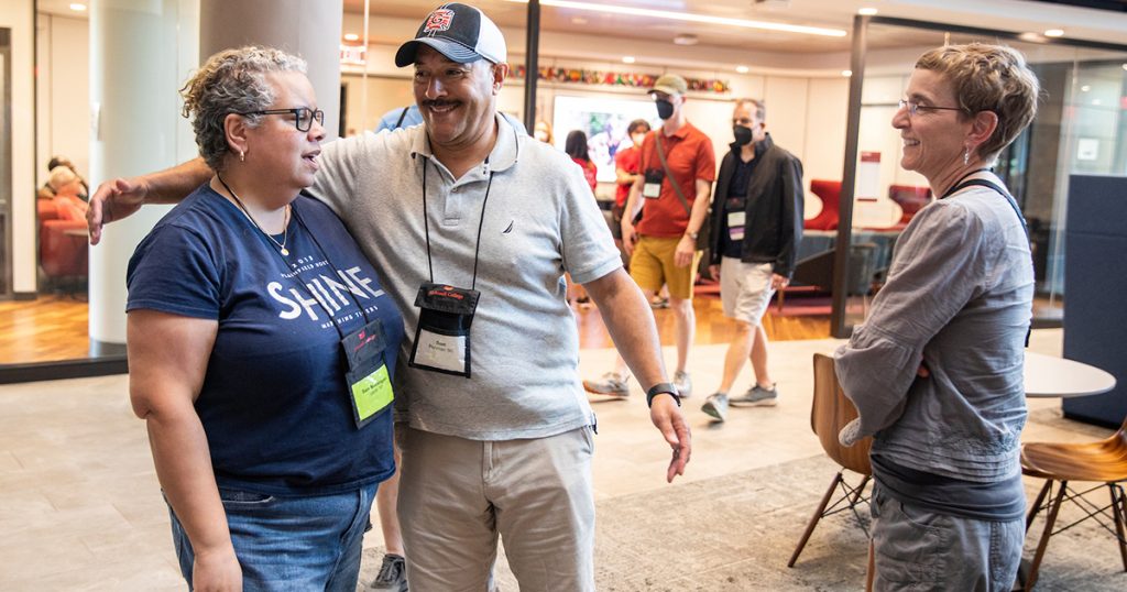 Grinnellians greet each other as they come back on to campus for reunion.