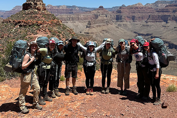 Students pose for a group shot during the Grinnell Outdoor Recreation Program trip to the Grand Canyon.
