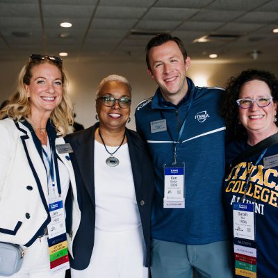 People posing at gathering