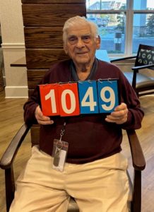 Martone holding scorecards - 1049