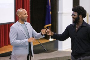 Kharmen Wingard M ’11 with an EOP student